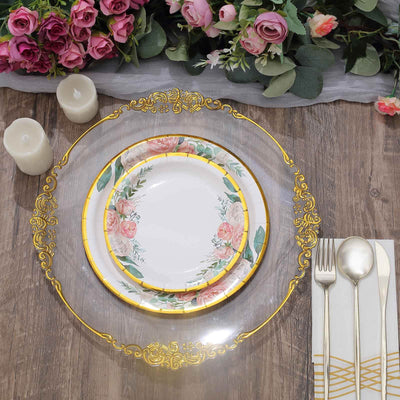 Elegant floral dinner plate with gold trim, styled on a rustic wooden table.