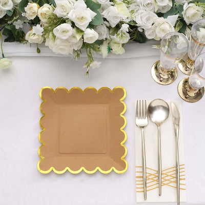 Gold-trimmed square paper plate with cutlery and floral arrangement