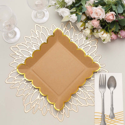 Gold-trimmed square plate on decorative placemat with floral arrangement