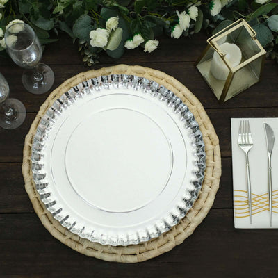 Elegant silver rimmed charger plate on a natural woven placemat.