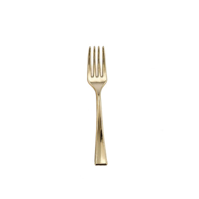 Gold dinner fork on white background