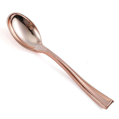 Rose gold serving spoon with a sleek design