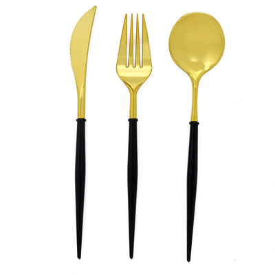 Elegant gold cutlery set: knife, fork, and spoon with black handles.