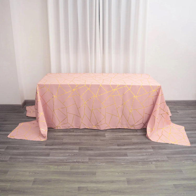 90 Inch x 156 Inch Dusty Rose Polyester Tablecloth With Gold Foil Geometric Pattern