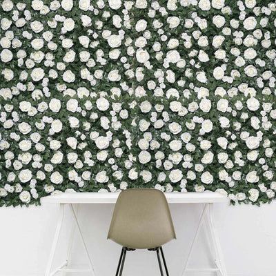White rose wall mural with a minimalist desk and chair.