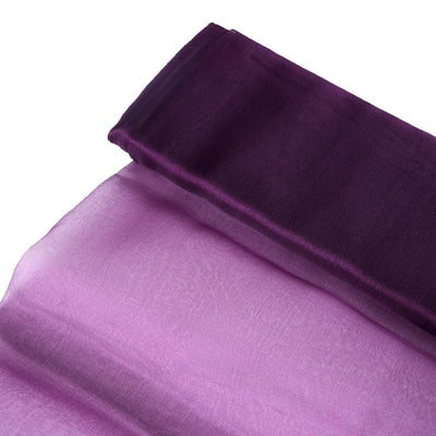 Purple sheer fabric draped elegantly in soft folds.