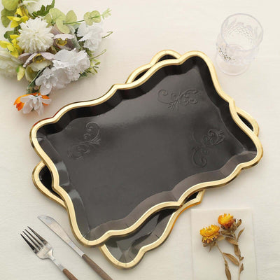 Elegant black serving trays with gold accents, perfect for entertaining.