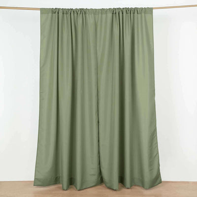 Olive green curtain panels on a white backdrop