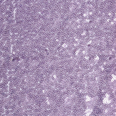 Purple sequin fabric with a textured pattern.