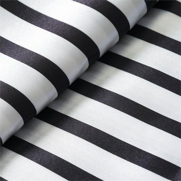 Elevate Your Event Decor with the Black and White Satin Stripe Fabric Bolt
