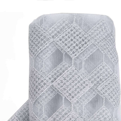 Gray lace fabric roll with diamond pattern on white background