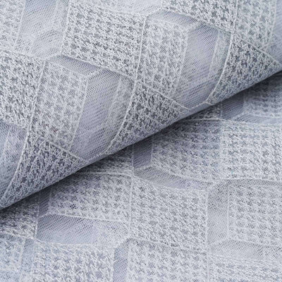 Gray textured fabric roll with geometric pattern.