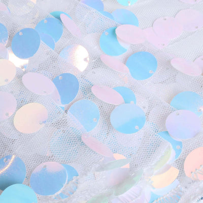Pastel holographic sequins on sheer mesh fabric.