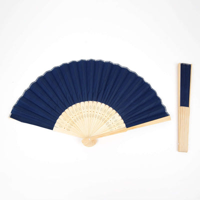 Navy folding fan with wooden handle on a white background