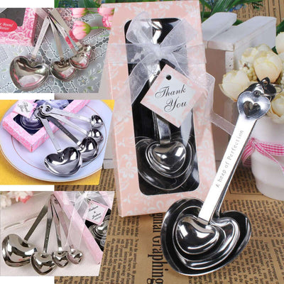 Heart-shaped measuring spoons set in a gift box with a thank you tag.