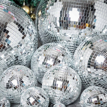 Create a Groovy Atmosphere with the Silver Hanging Disco Ball Decor