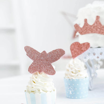 Glitter butterfly cupcake topper in blue and white wrapper