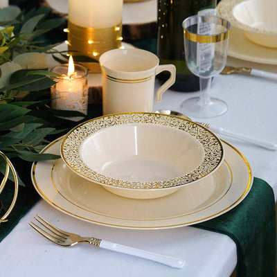 Elegant dinnerware set with gold accents on a beautifully arranged table.