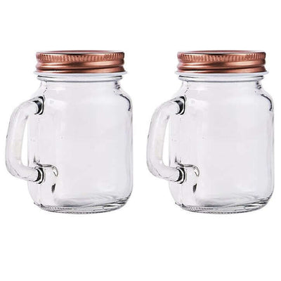Set of two clear glass jars with copper lids