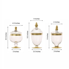 3 Set of Clear Glass Apothecary Candy Jars with Gold Trim and Snap On Lids 9 Inch 9 Inch 8 Inch