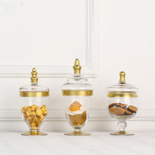 Set of 3 of Clear Apothecary Candy Glass Jars with Gold Trim and Snap On Lids 9 Inch 9 Inch 8 Inch