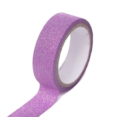 Purple glitter washi tape roll on a white background