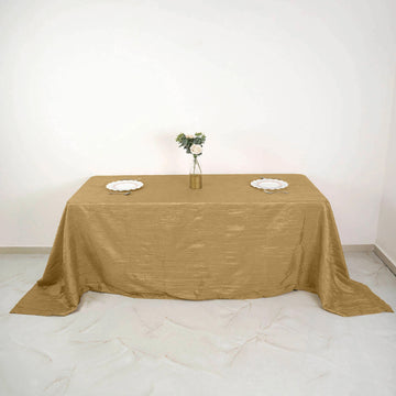 Elevate Your Event with the Gold Accordion Crinkle Taffeta Seamless Rectangular Tablecloth