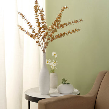 Elevate Your Event Décor with Gold Artificial Eucalyptus Leaf