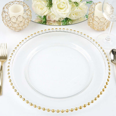 Elegant clear plate with gold beaded rim, styled for a refined dining setting.
