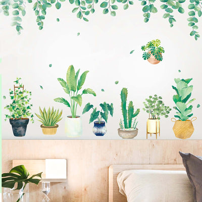 Decorative wall art featuring various potted plants in a bedroom setting.
