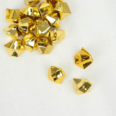 Gold decorative geometric shapes on a white background