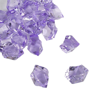 Purple decorative acrylic crystals on a white background.