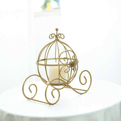 Gold decorative candle holder with intricate design on a table.