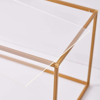 Gold metal frame coffee table with a minimalist design