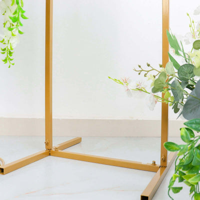 Gold metal stand base with floral decorations