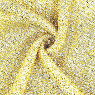 Shimmering gold fabric with intricate texture and sparkling details.