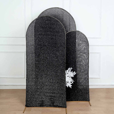 Black and silver decorative room dividers in varying heights