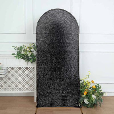 Black arch backdrop with textured surface for photography or events.