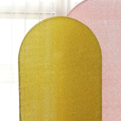 Gold glitter backdrop with soft curves for photography.