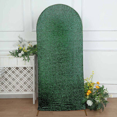 Green sequin backdrop with arched top for events and photography.