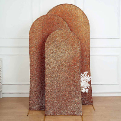Three decorative arch screens in gold and copper tones.