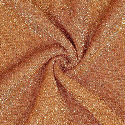 Glittery orange fabric with a shimmering texture in a swirling pattern.