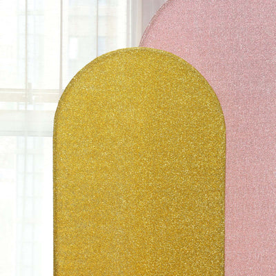 Glittery gold and pink decorative panels against a soft backdrop.