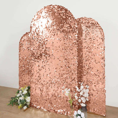 Rose gold sequin backdrop with floral accents for events and photo shoots.