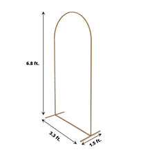 A gold metal round top rectangular backdrop stand with sturdy base, measuring 6.8 ft in height, 3.3 ft in length, and 1.5 ft in width