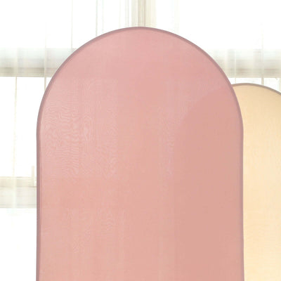 Pink and cream fabric backdrops in soft tones for photography.