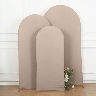 Three beige fabric backdrops in various sizes on a plain background.