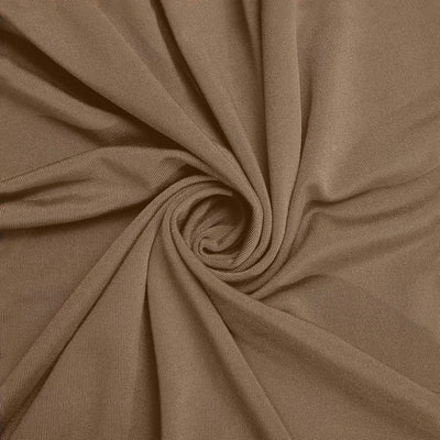 Brown fabric texture with a swirl pattern.