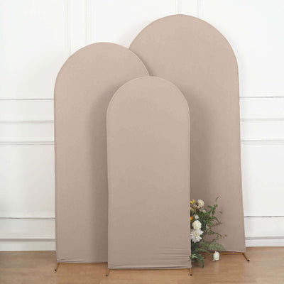 Three beige fabric backdrops in varying heights for photography.