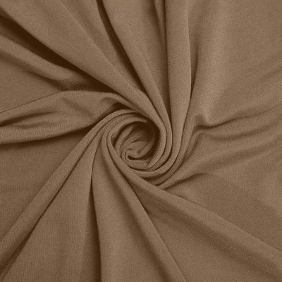 Brown textured fabric in a swirl pattern.